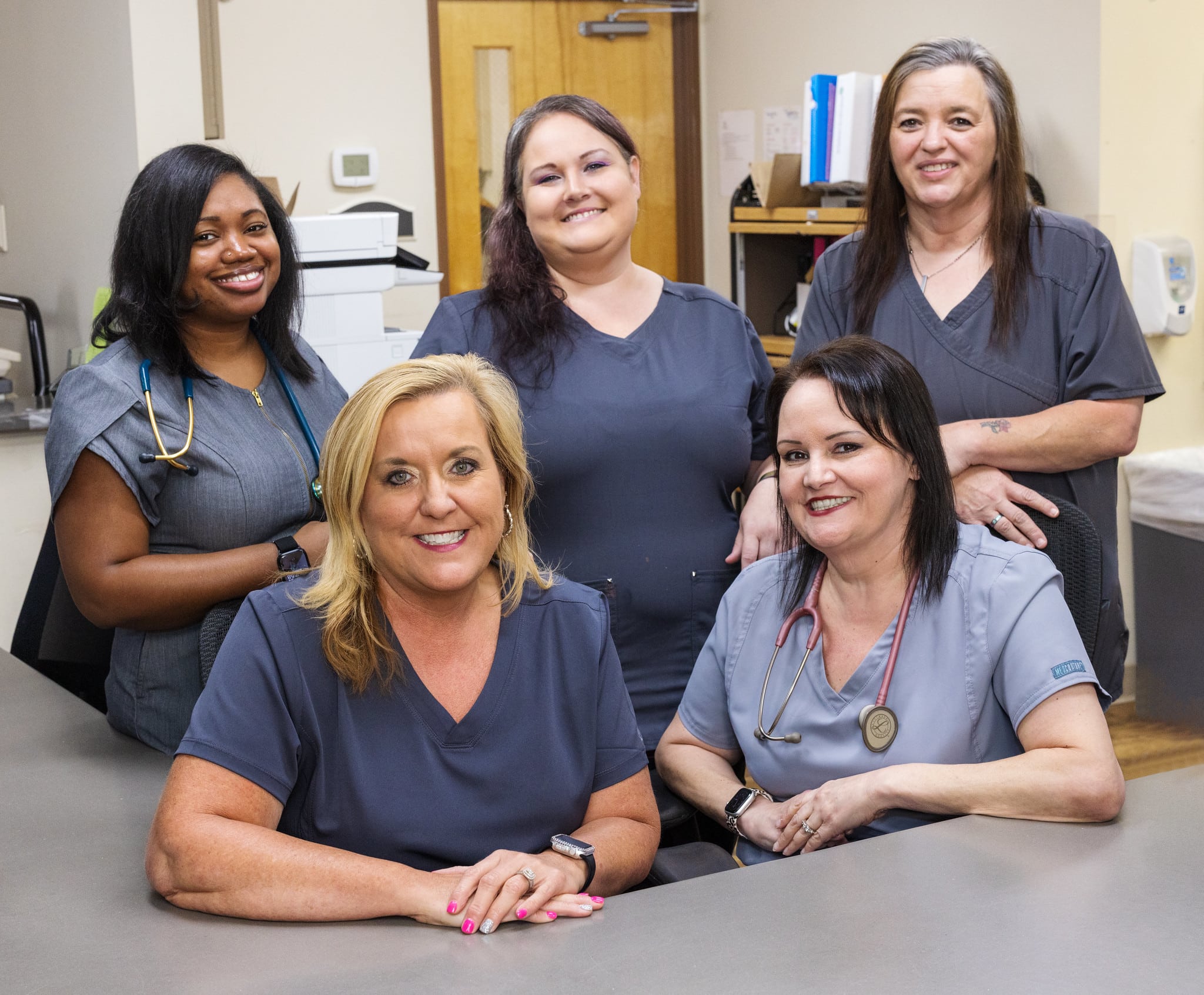 Five nurses at nurses' station in Linley Park
