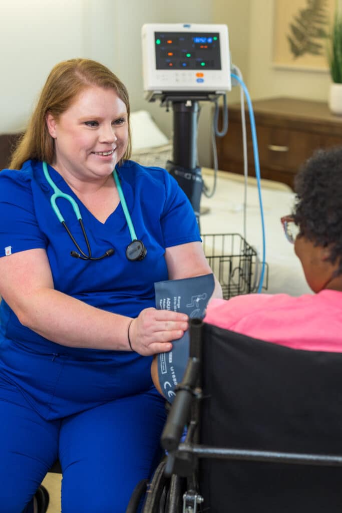 Nurse taking patient's blood pressure at Linley Park